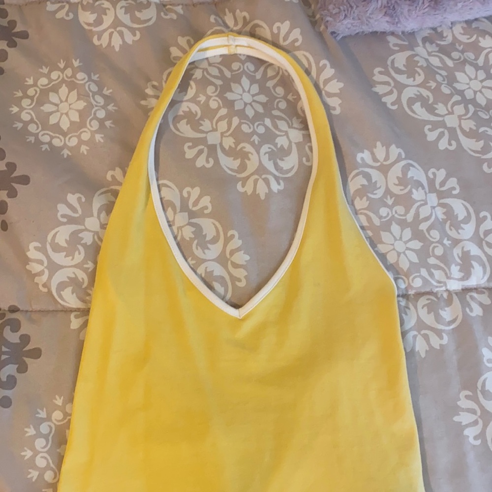 small yellow & white bodysuit